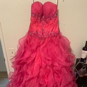 Magenta ruffled quinceañera dress